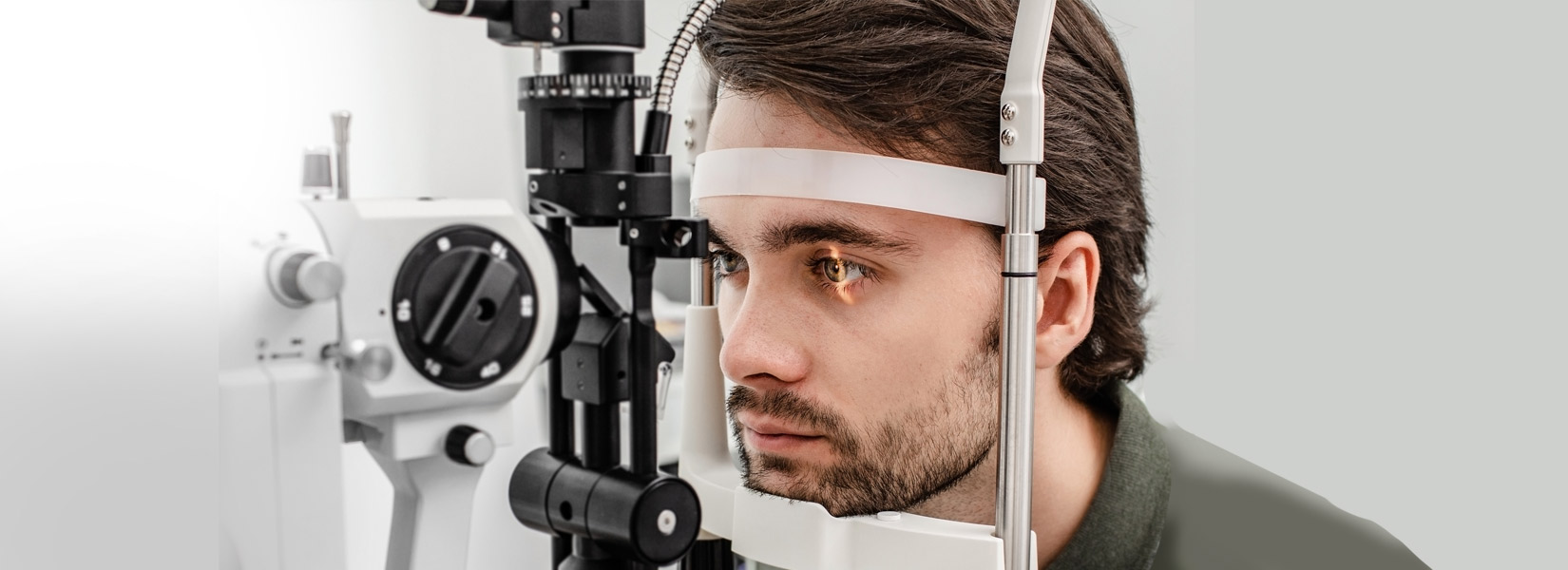 young man during eye exam in Toledo